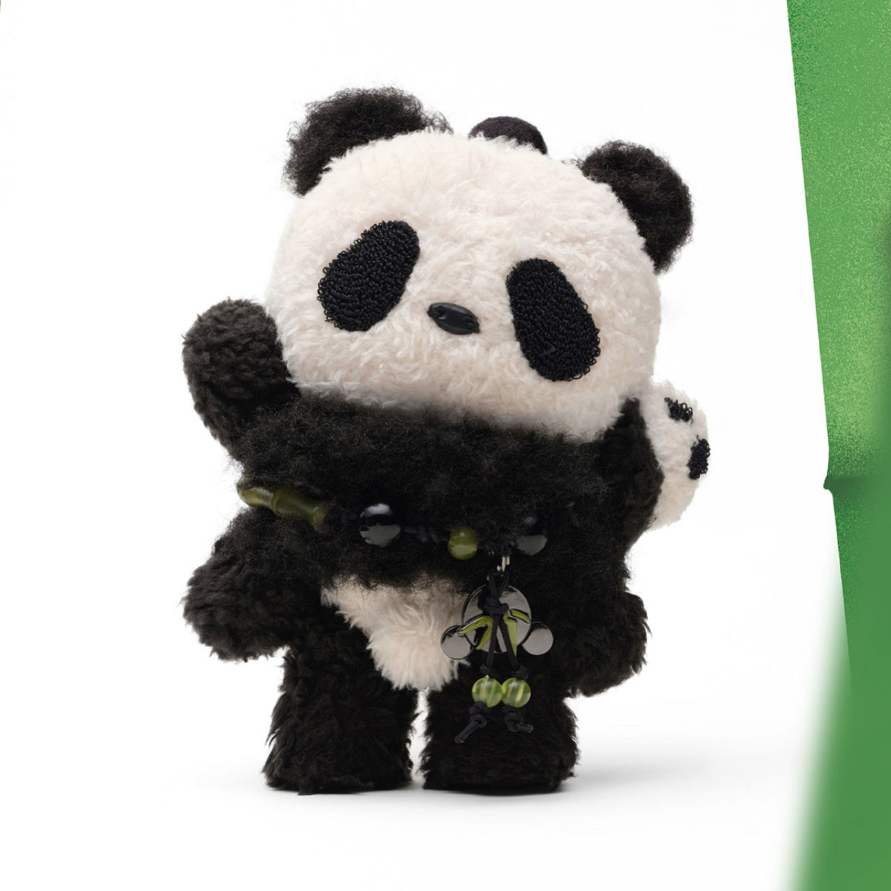 SkullPanda “Lazy Panda” Limited Edition Pop Mart collectible figure side view with panda suit details.